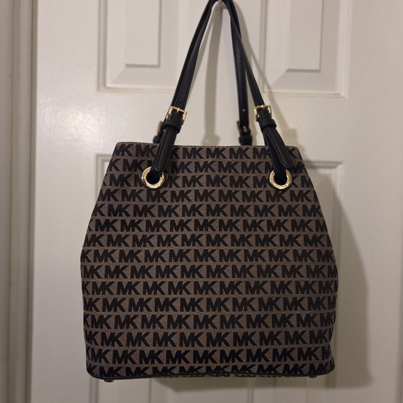 Michael Kors: Gently Used Condition Signature Black and Tan Tote. - Picture 11 of 16